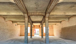 Die Unterzüge und Stützen wurden gemäß statischen Vorgaben von uns umwehrt...